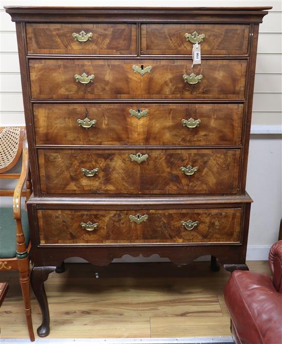 An 18th century walnut chest on stand W.94cm